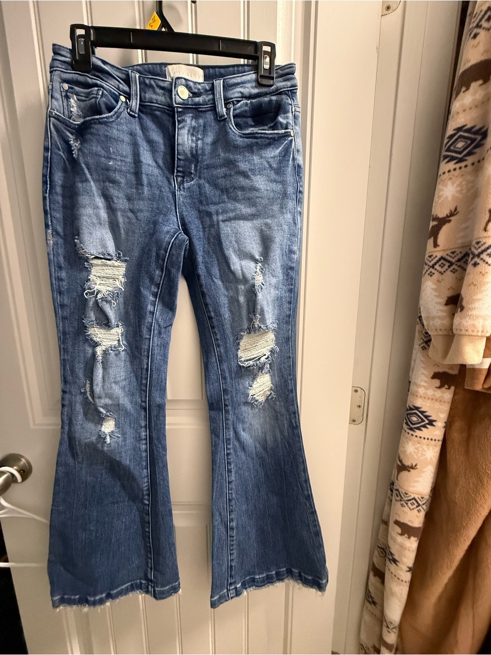 High-Rise Distressed Flare Jeans - Blue